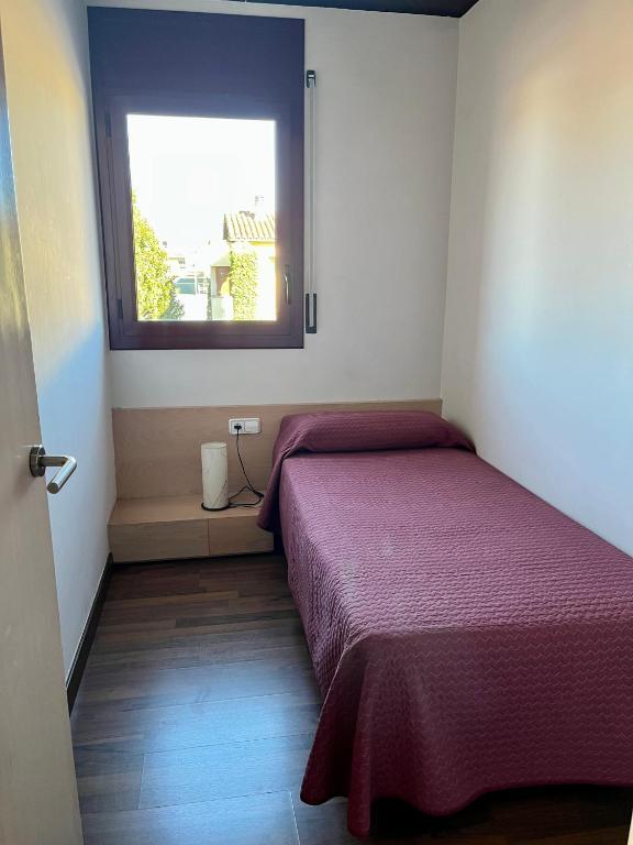 Posteľ alebo postele v izbe v ubytovaní Can Morera Apartaments a Les Preses