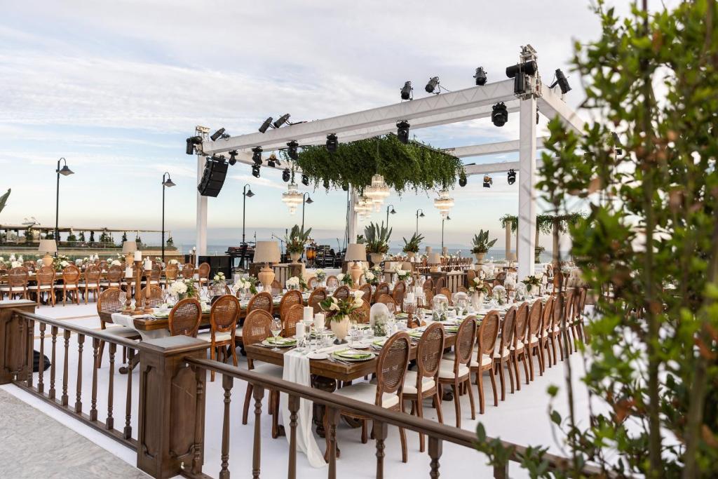 a table set up for a wedding on a deck at Crowne Plaza Florya Istanbul by IHG in Istanbul