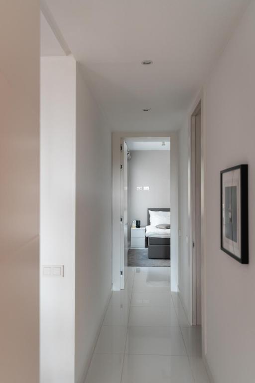 Posteľ alebo postele v izbe v ubytovaní NOBBLE apartment Atalaya Hills