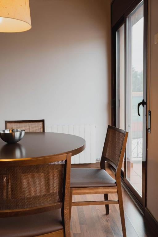 Posedenie v ubytovaní Can Morera Apartaments a Les Preses