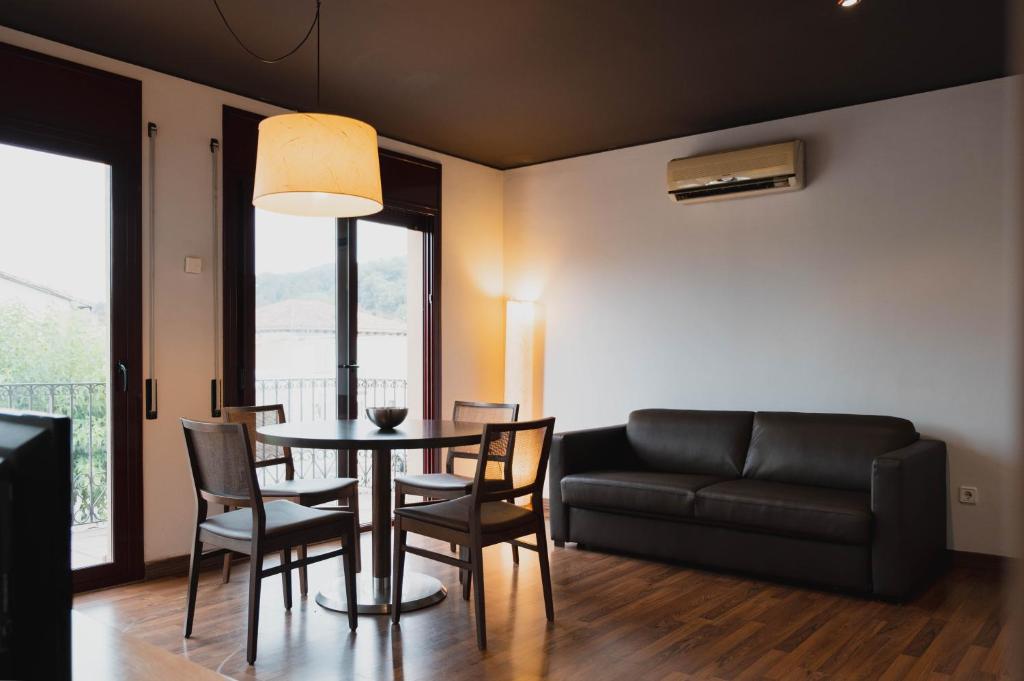 Posedenie v ubytovaní Can Morera Apartaments a Les Preses