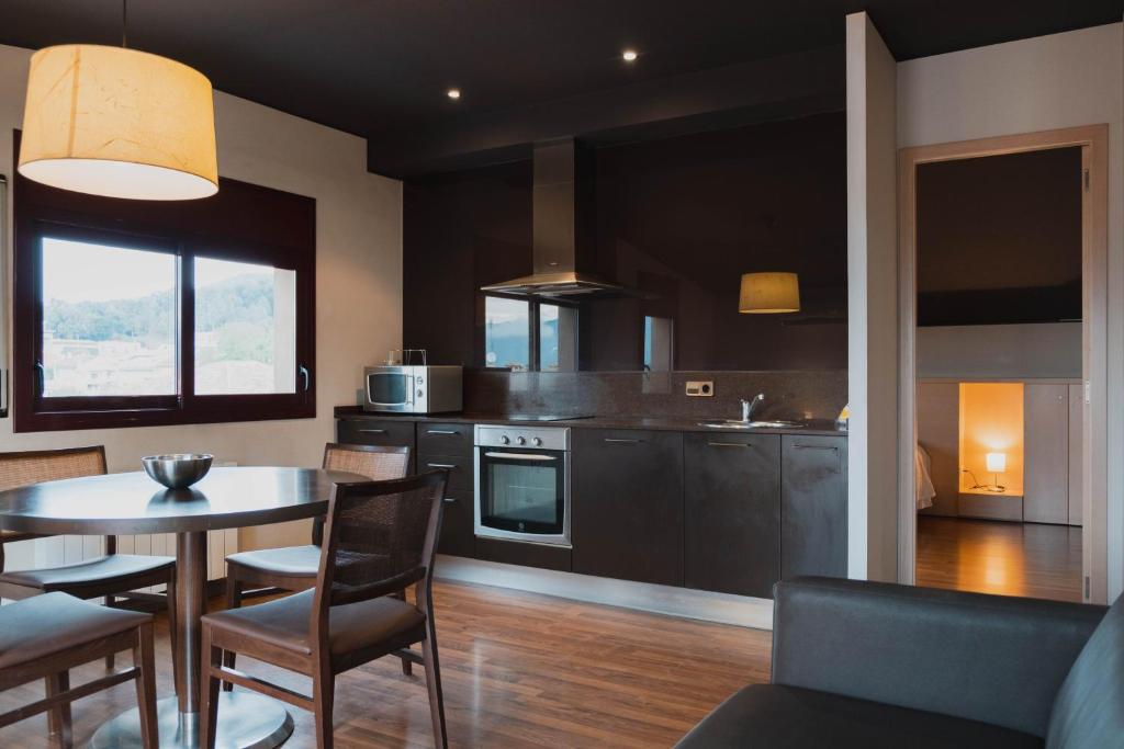 Kuchyňa alebo kuchynka v ubytovaní Can Morera Apartaments a Les Preses