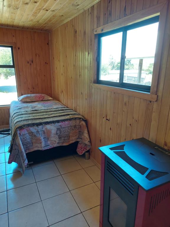 Postel nebo postele na pokoji v ubytování Cabaña Loft Curaco de Vélez