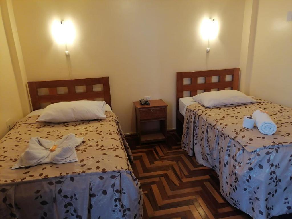 Postel nebo postele na pokoji v ubytování Suyay B&B