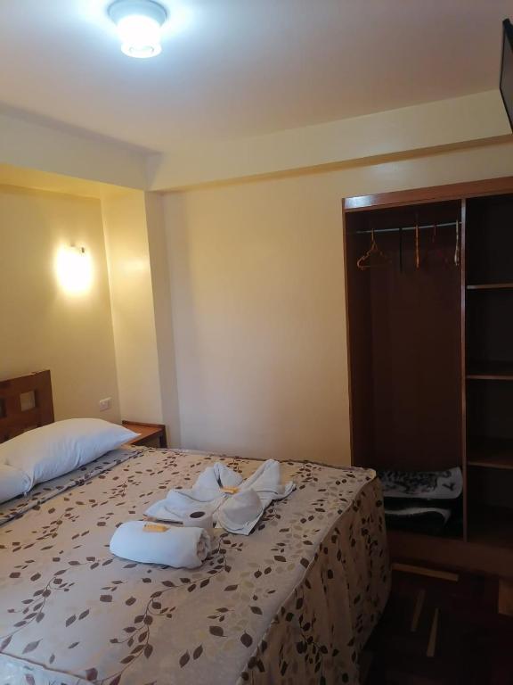 Postel nebo postele na pokoji v ubytování Suyay B&B