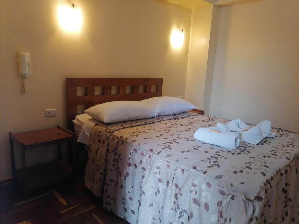 Postel nebo postele na pokoji v ubytování Suyay B&B