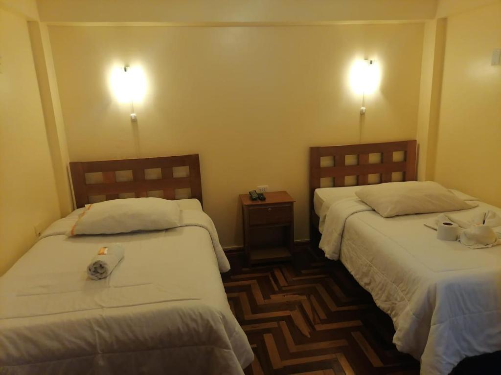 Postel nebo postele na pokoji v ubytování Suyay B&B