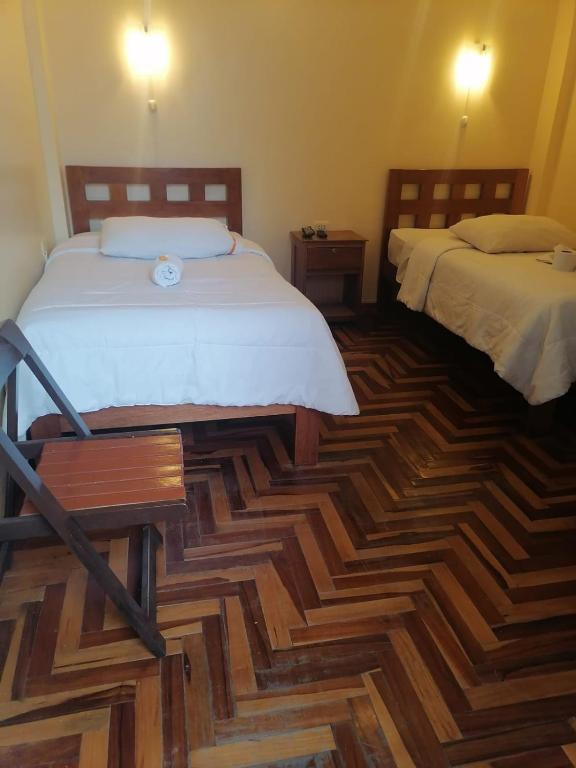 Postel nebo postele na pokoji v ubytování Suyay B&B