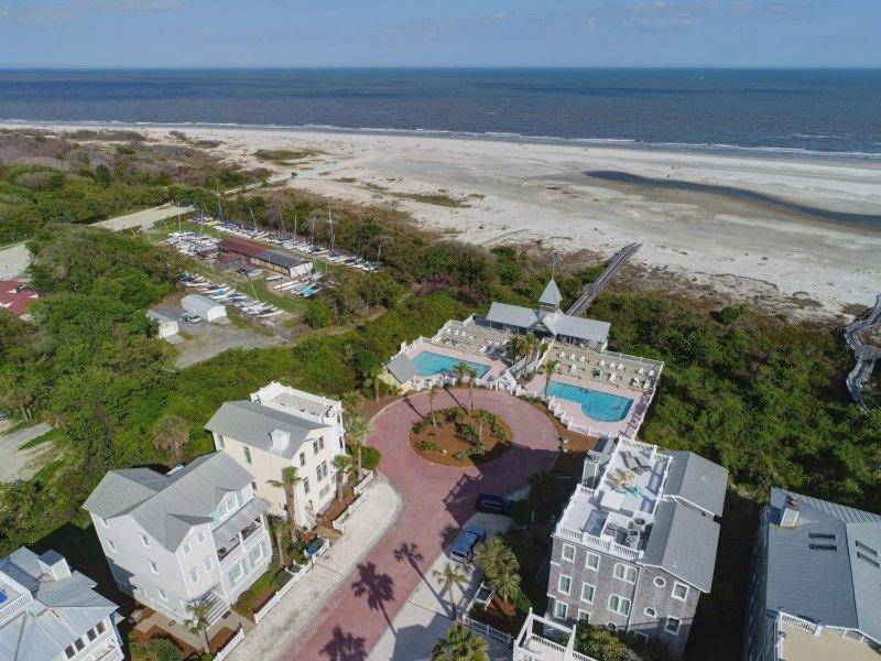 an aerial view of a resort and the beach at Satilla Cottage - 15 Coast Cottage Ln in East End