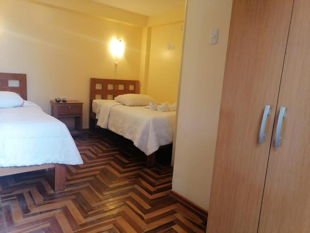 Postel nebo postele na pokoji v ubytování Suyay B&B