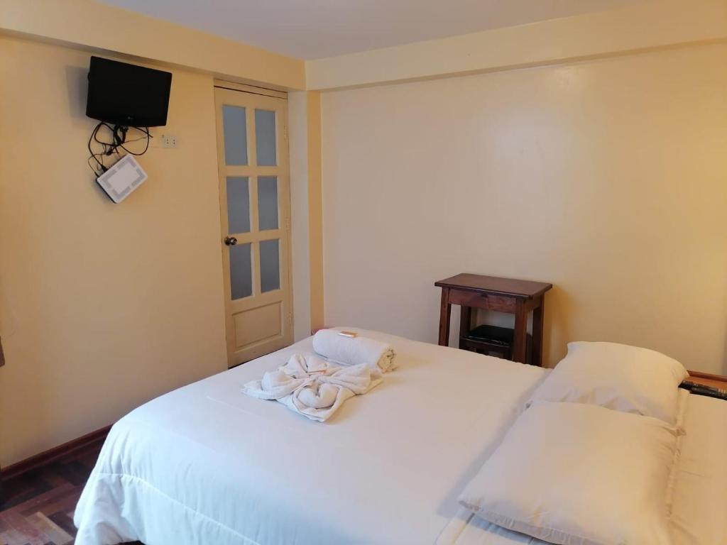Postel nebo postele na pokoji v ubytování Suyay B&B