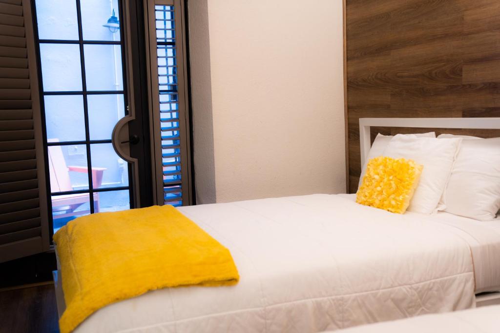 Postel nebo postele na pokoji v ubytování Amsterdam Hostel