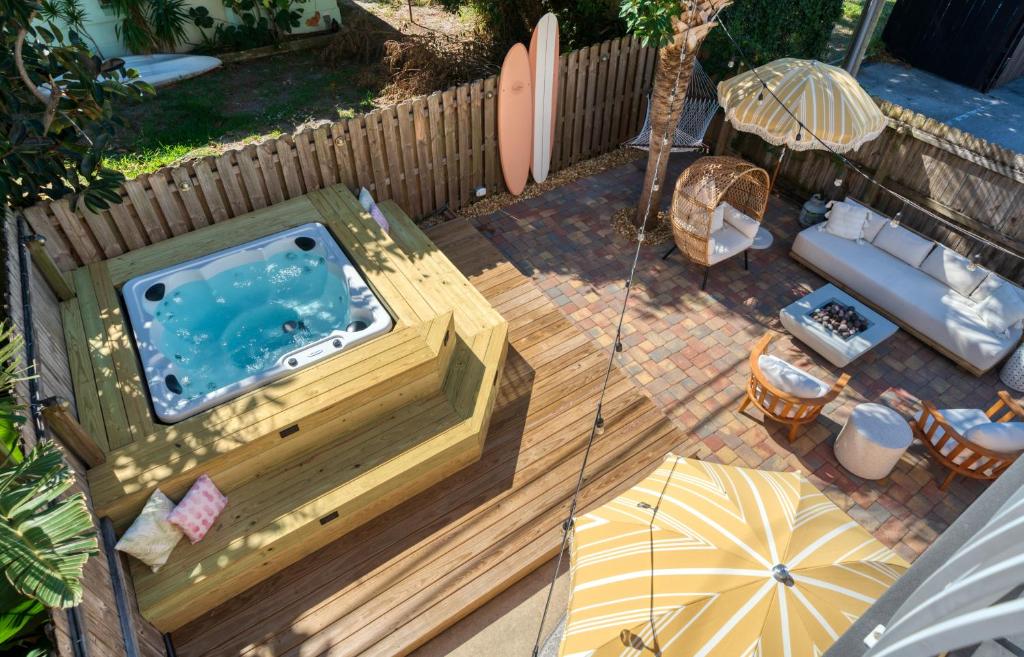 an overhead view of a hot tub in a backyard at Luxury Villa 3 Blocks from the Beach with Hot Tub a Fire Pit and Outdoor Oasis in Cape Canaveral