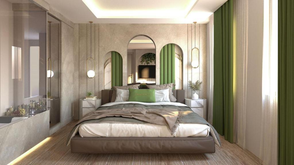 a bedroom with a large bed and a mirror at Lord Morgan & Exclusive Design Cihangir in Istanbul