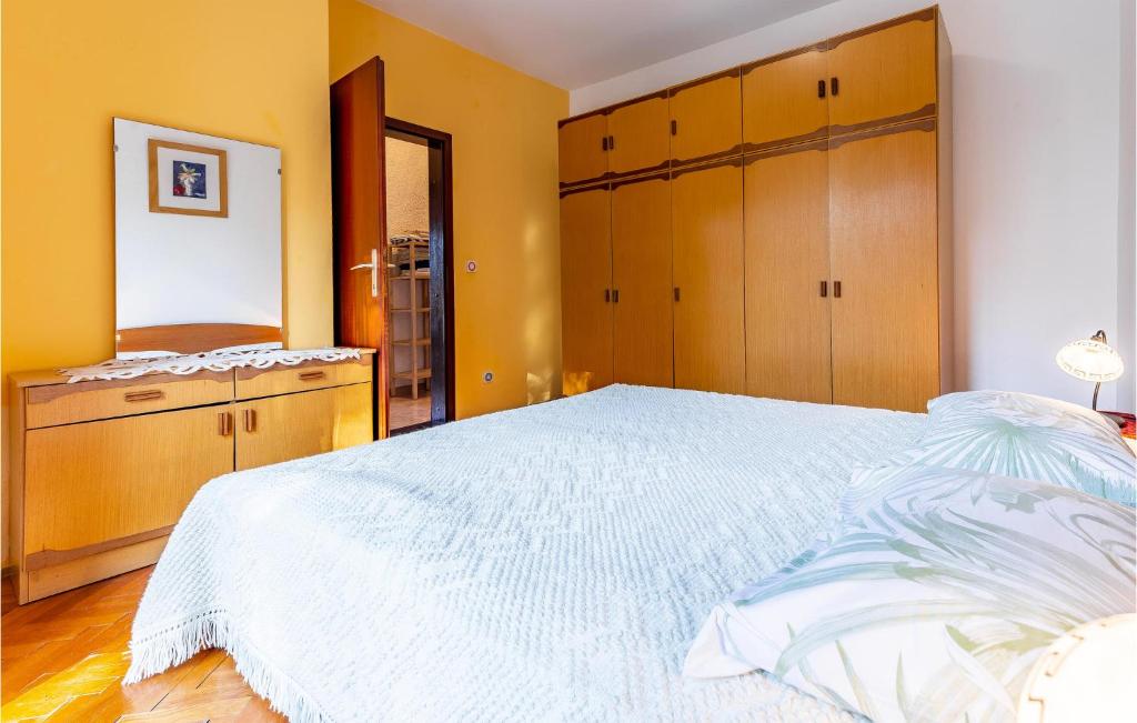 Łóżko lub łóżka w pokoju w obiekcie Apartment Centar I