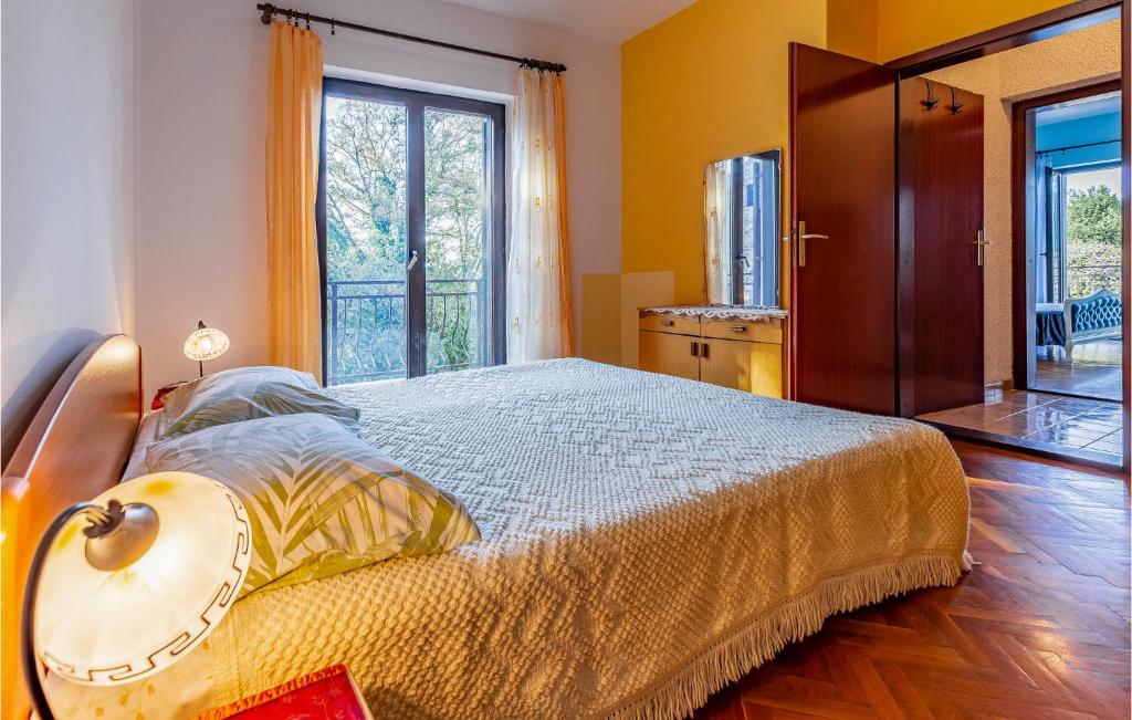 Łóżko lub łóżka w pokoju w obiekcie Apartment Centar I