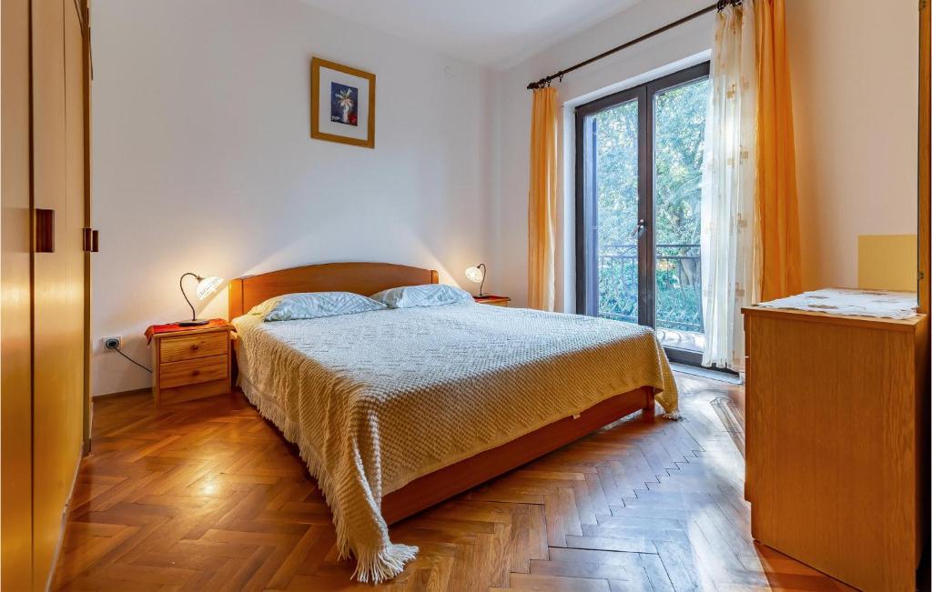 Łóżko lub łóżka w pokoju w obiekcie Apartment Centar I