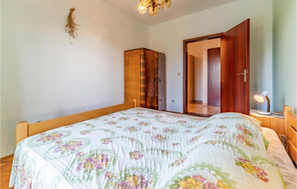 Łóżko lub łóżka w pokoju w obiekcie Apartment Centar I