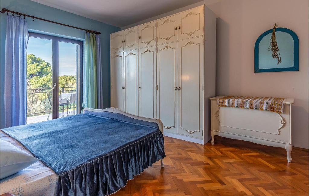 Łóżko lub łóżka w pokoju w obiekcie Apartment Centar I