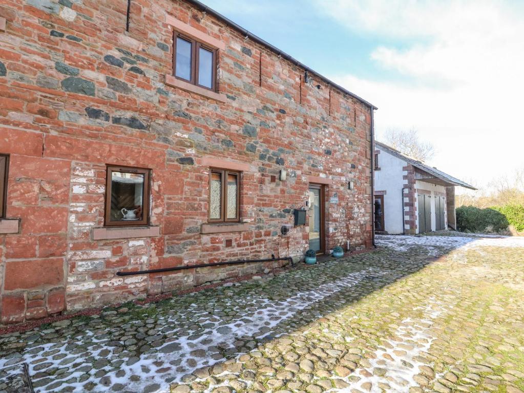 an external view of a brick building at Blencathra Barn in Penrith