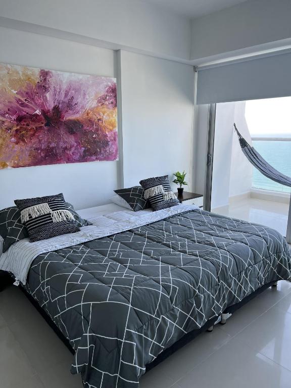 Postel nebo postele na pokoji v ubytování Playa Cartagena Apartments