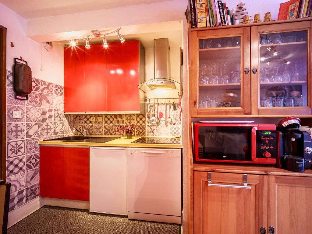 Kuchyňa alebo kuchynka v ubytovaní Confort et Praticité : Appartement 4 Pers. à St-Lary Village, Proche Commerces et Téléphérique - FR-1-296-455