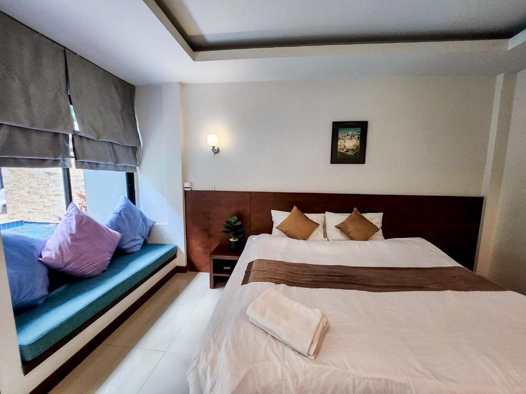 Postel nebo postele na pokoji v ubytování Diana Pool Access Phuket