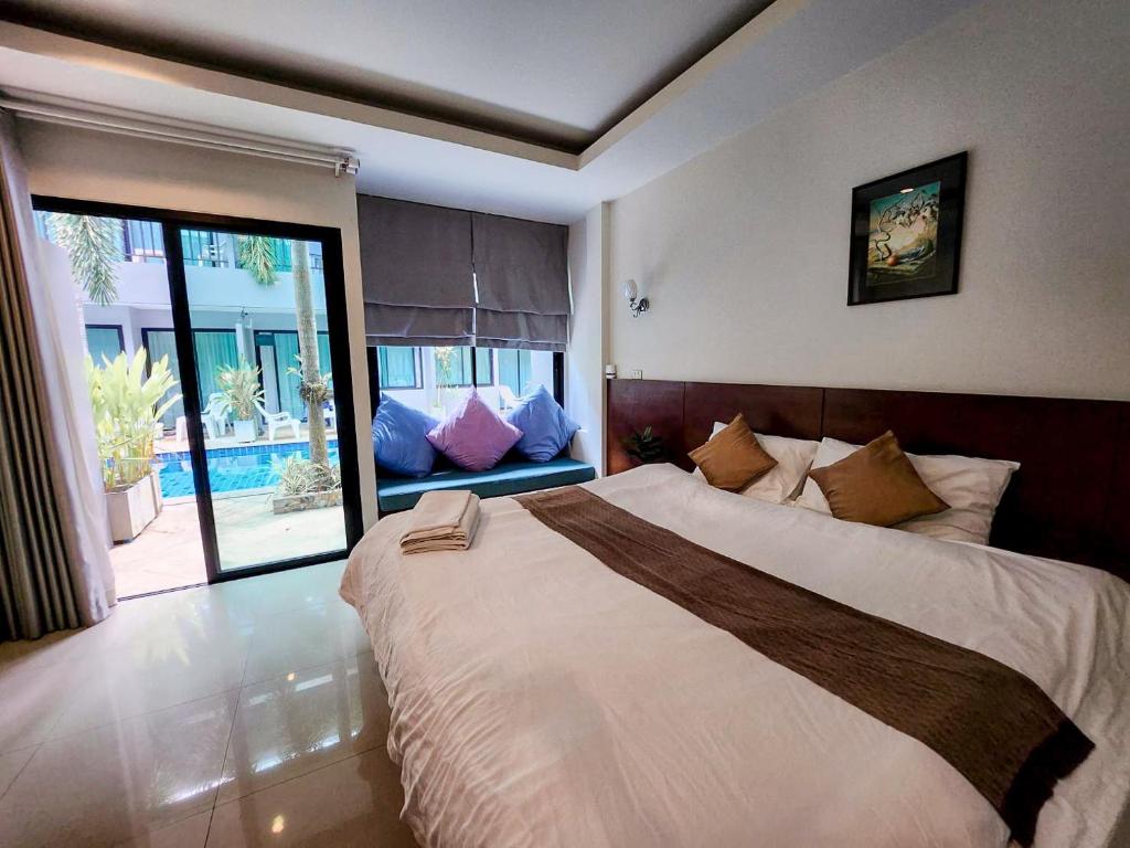 Posteľ alebo postele v izbe v ubytovaní Diana Pool Access Phuket