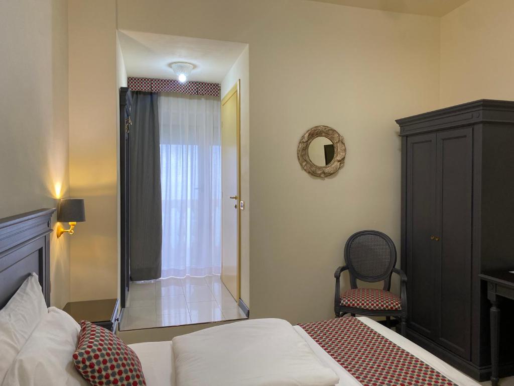 Postel nebo postele na pokoji v ubytování Hotel Estée