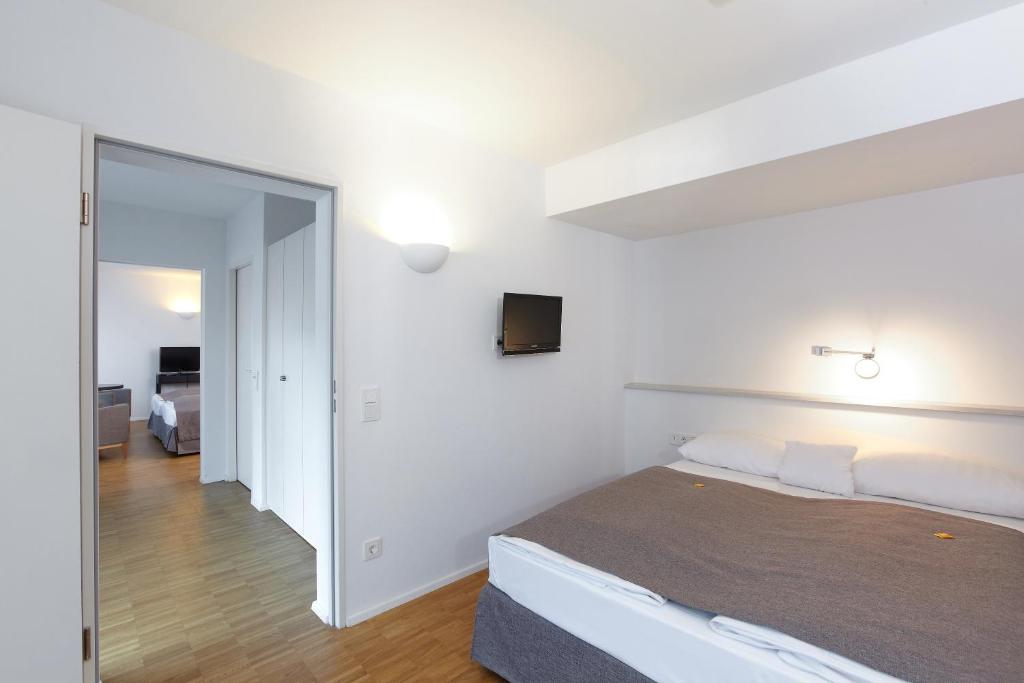 Postel nebo postele na pokoji v ubytování Hotel Klingelhöffer