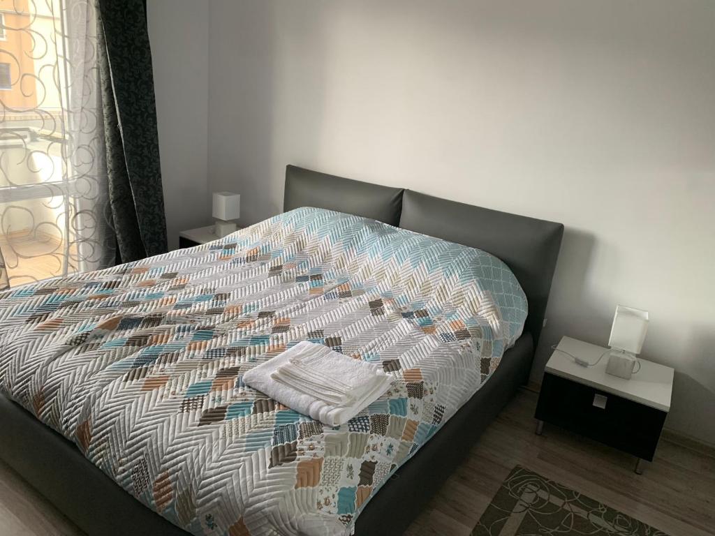 Postel nebo postele na pokoji v ubytování B&B Iulius