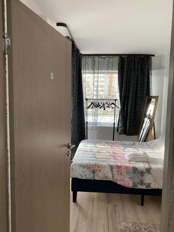Postel nebo postele na pokoji v ubytování B&B Iulius