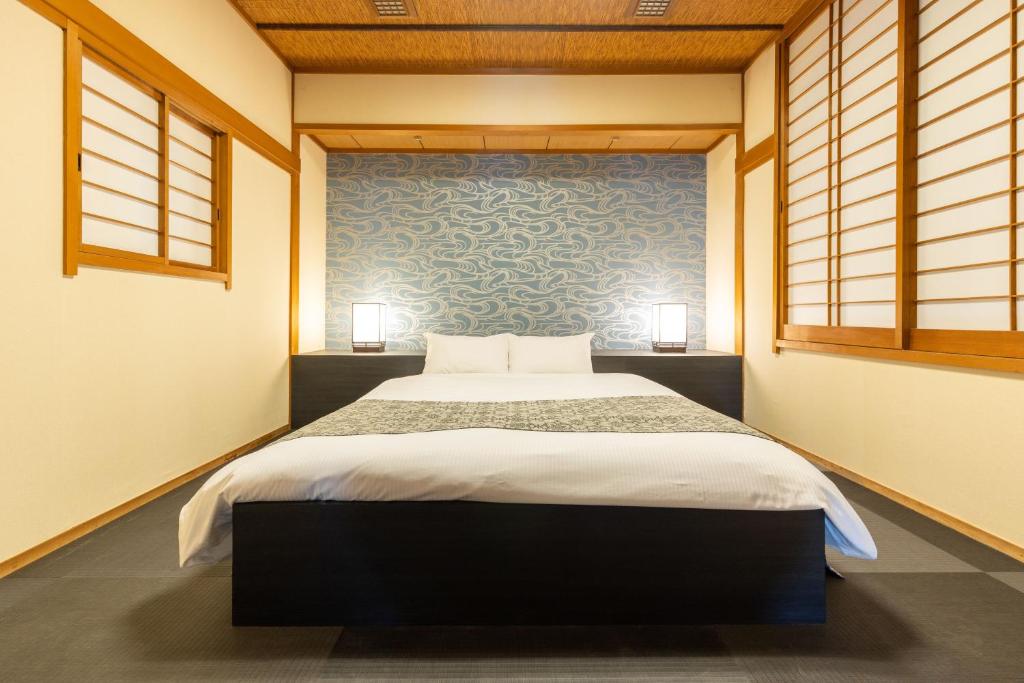 Postel nebo postele na pokoji v ubytování HOTEL Z23