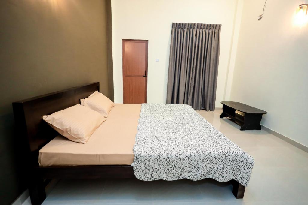 Postel nebo postele na pokoji v ubytování Negombo 146 Homestay