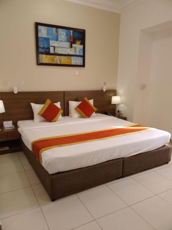 Letto o letti in una camera di La Villa Hotel
