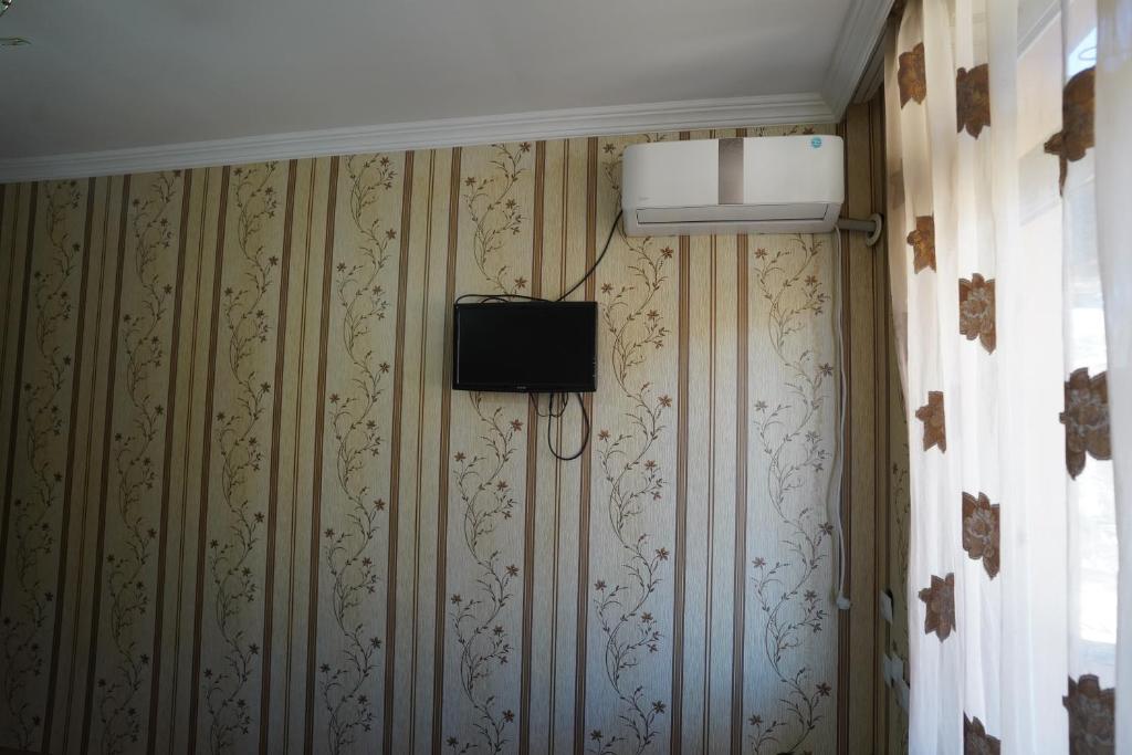 TV a/nebo společenská místnost v ubytování imperator 1 Hotel