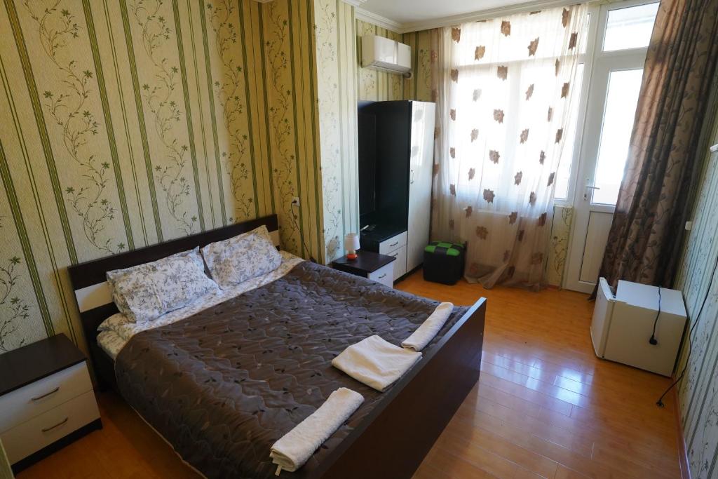 Postel nebo postele na pokoji v ubytování imperator 1 Hotel