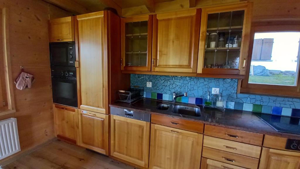 Kuchyň nebo kuchyňský kout v ubytování Chalet AS des Pics