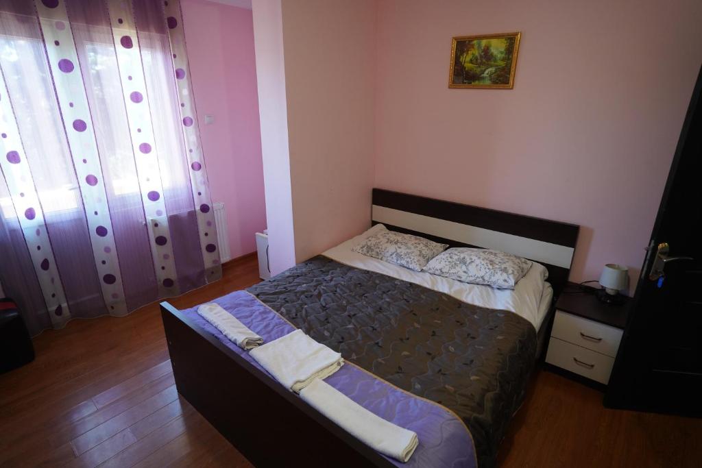 Postel nebo postele na pokoji v ubytování imperator 1 Hotel
