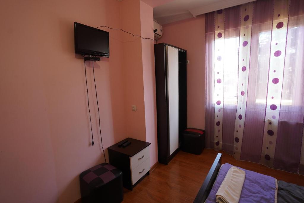 TV a/nebo společenská místnost v ubytování imperator 1 Hotel