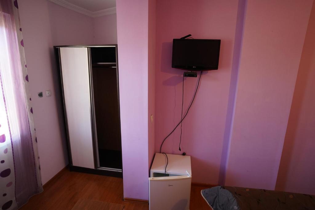 TV a/nebo společenská místnost v ubytování imperator 1 Hotel