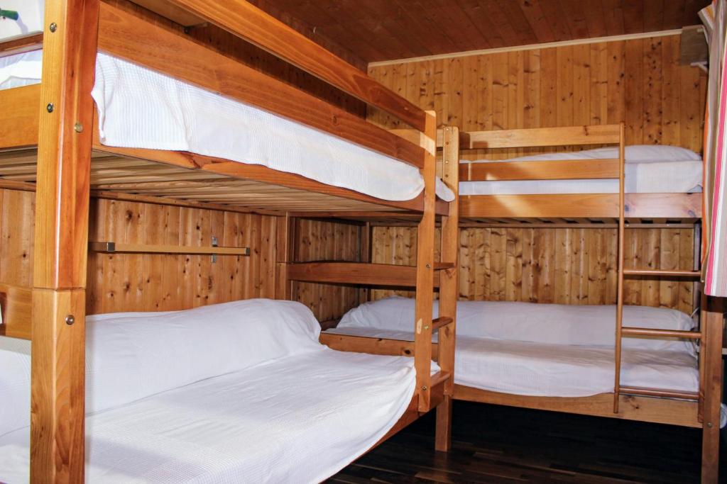 Postel nebo postele na pokoji v ubytování Chalet AS des Pics