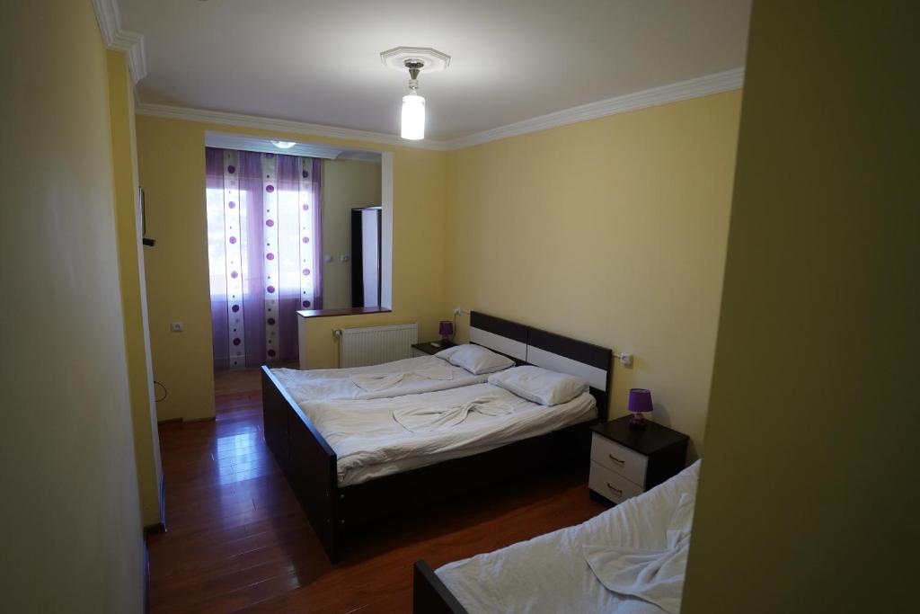 Postel nebo postele na pokoji v ubytování imperator 1 Hotel