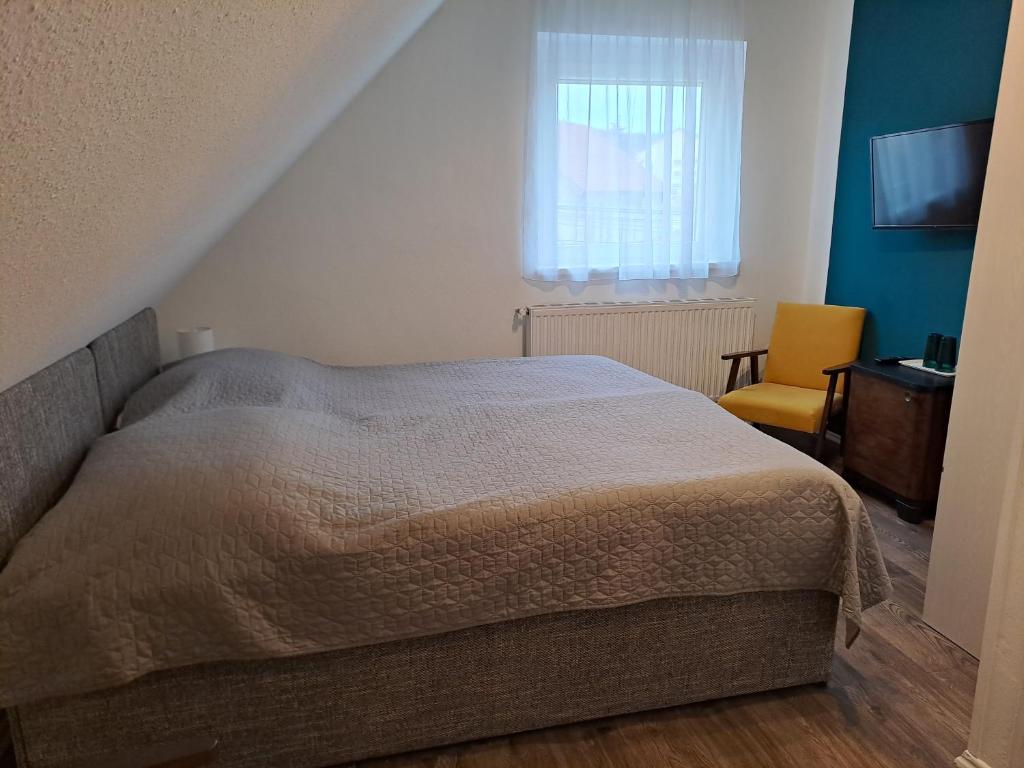 Postel nebo postele na pokoji v ubytování Diókert Vendégház Sopron