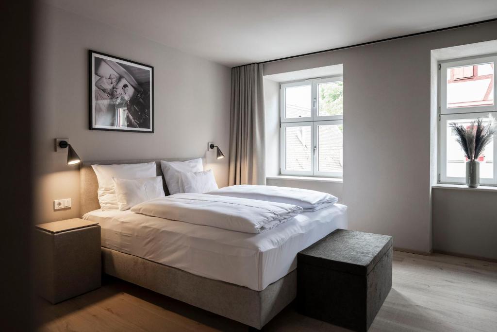 Postel nebo postele na pokoji v ubytování HOTEL & SPA Goldene Rose