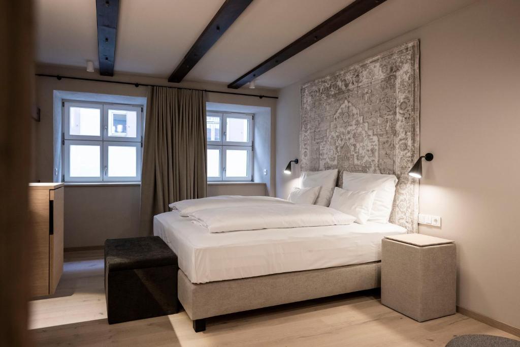 Postel nebo postele na pokoji v ubytování HOTEL & SPA Goldene Rose