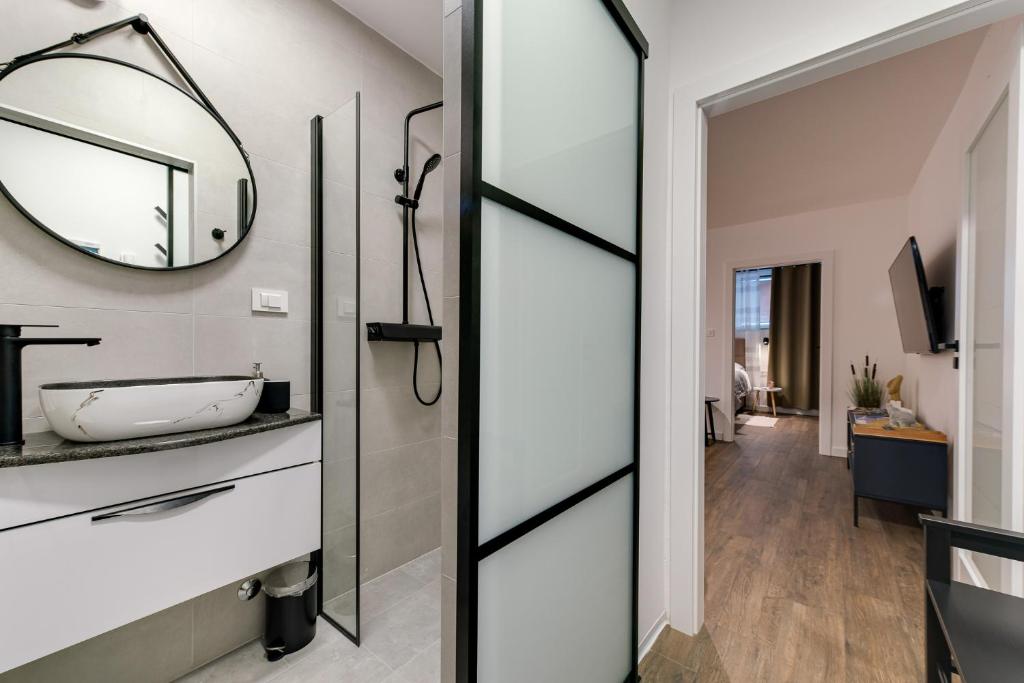 Postel nebo postele na pokoji v ubytování MINMAR Apartments