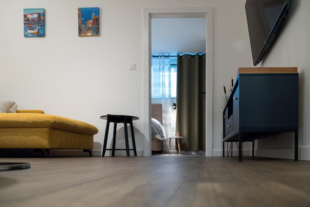 TV a/nebo společenská místnost v ubytování MINMAR Apartments