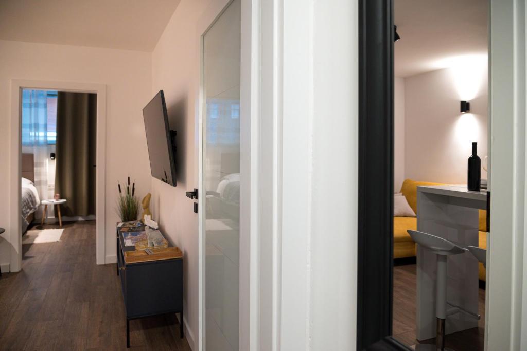 TV a/nebo společenská místnost v ubytování MINMAR Apartments