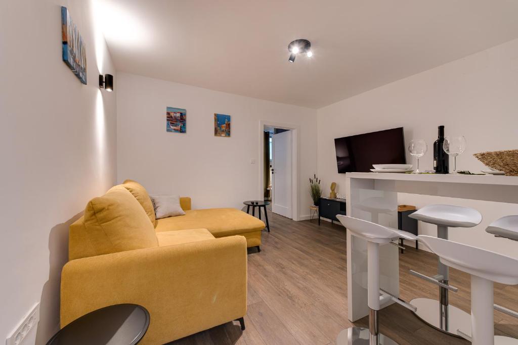 TV a/nebo společenská místnost v ubytování MINMAR Apartments